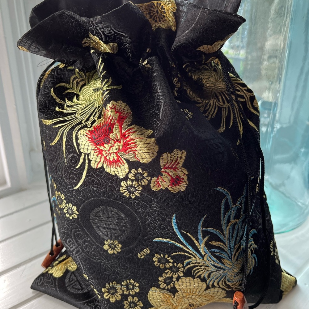 Embossed Chinese silk pouch
